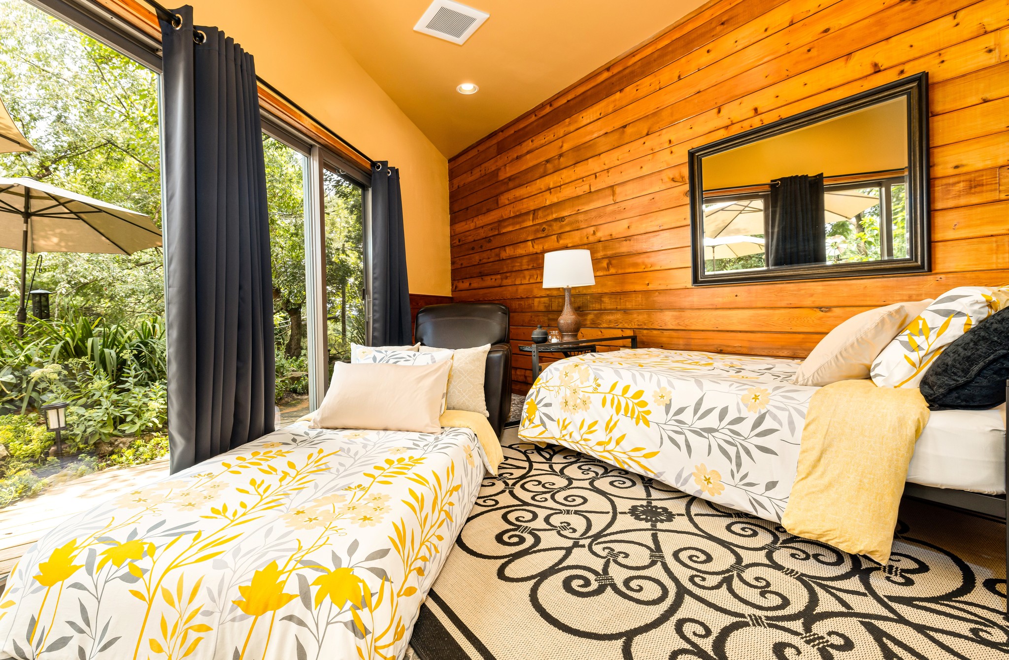 Whether lounging on the daybed/trundle in its 'closed' position, or getting a great night of sleep on the memory foam twins, you can enjoy pond sounds and fresh air with the doors open.