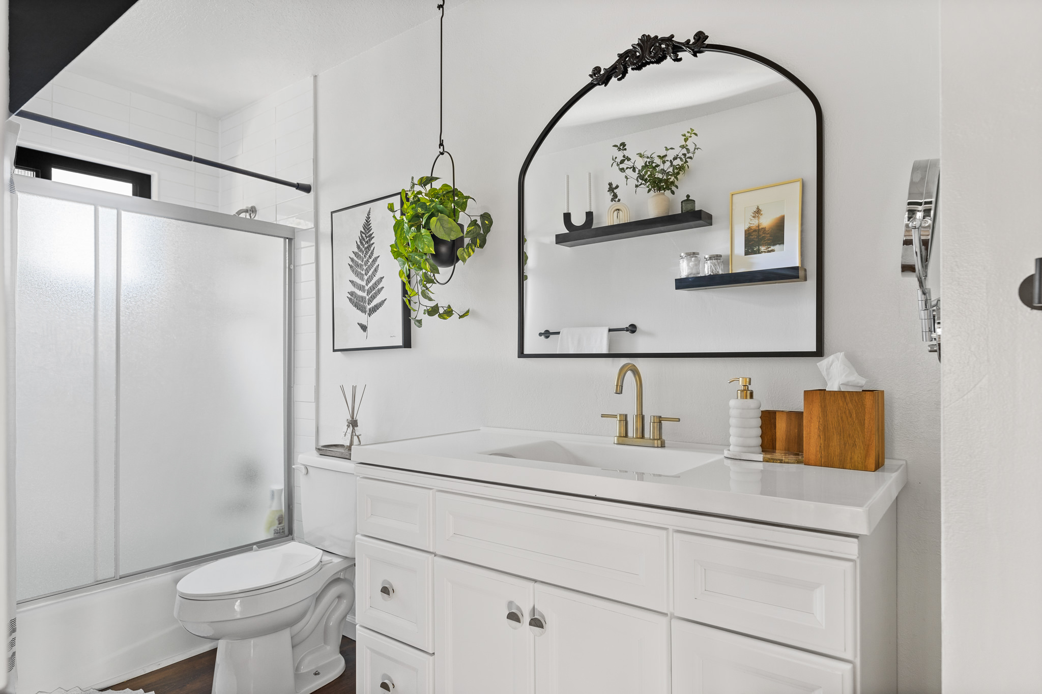 Bathroom 1: Discover a modern, full bathroom on the upper floor, complete with both a full bath and a refreshing shower.
