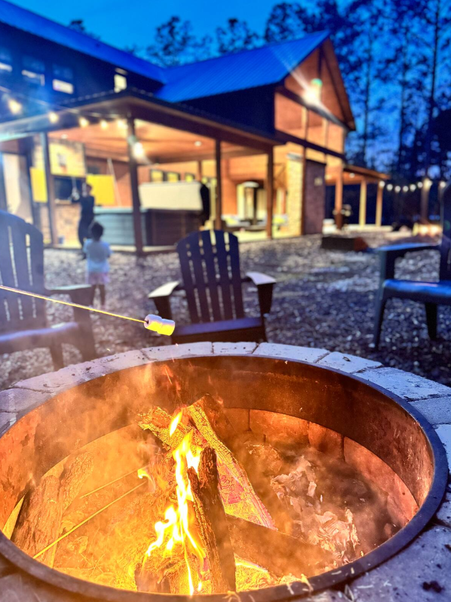 Firepit area perfect for gathering, roasting s’mores, and enjoying cozy nights under the stars with family and friends.