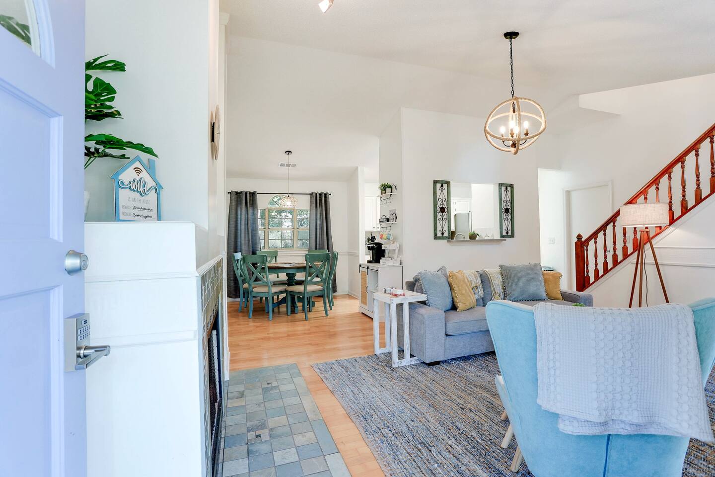 The open-concept design is seamlessly connects the living room to the dining area, creating a spacious and inviting environment perfect for family gatherings and entertaining.