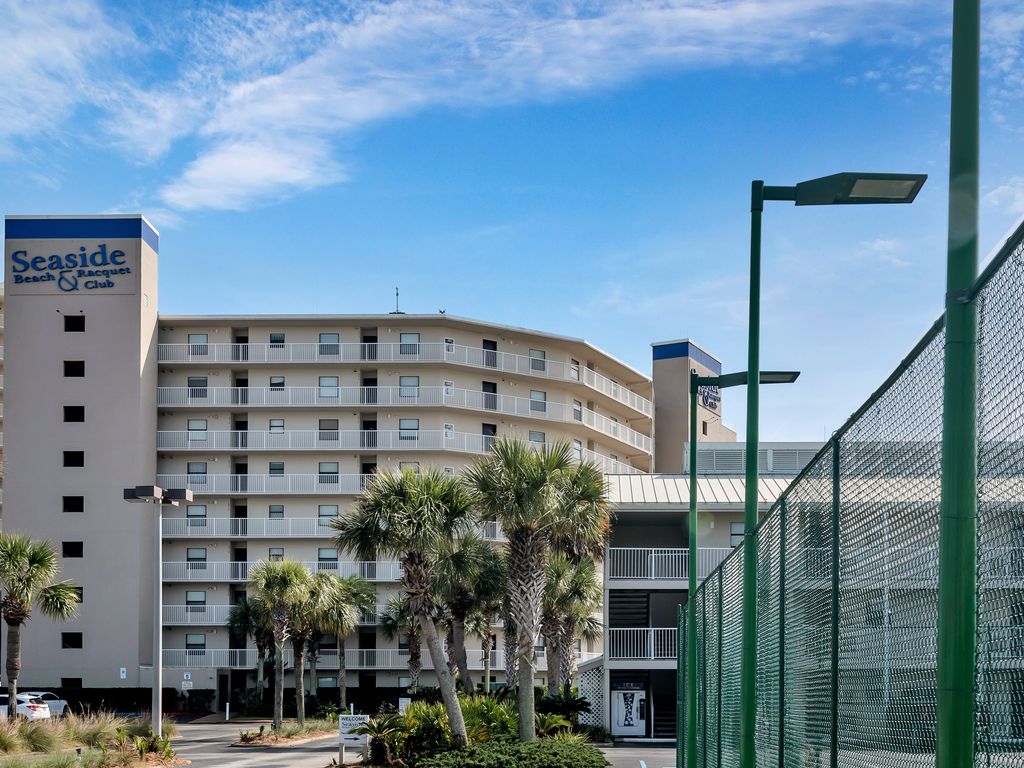 This prominent beachfront building stands as a testament to coastal architecture, providing residents and guests with an unparalleled seaside experience.