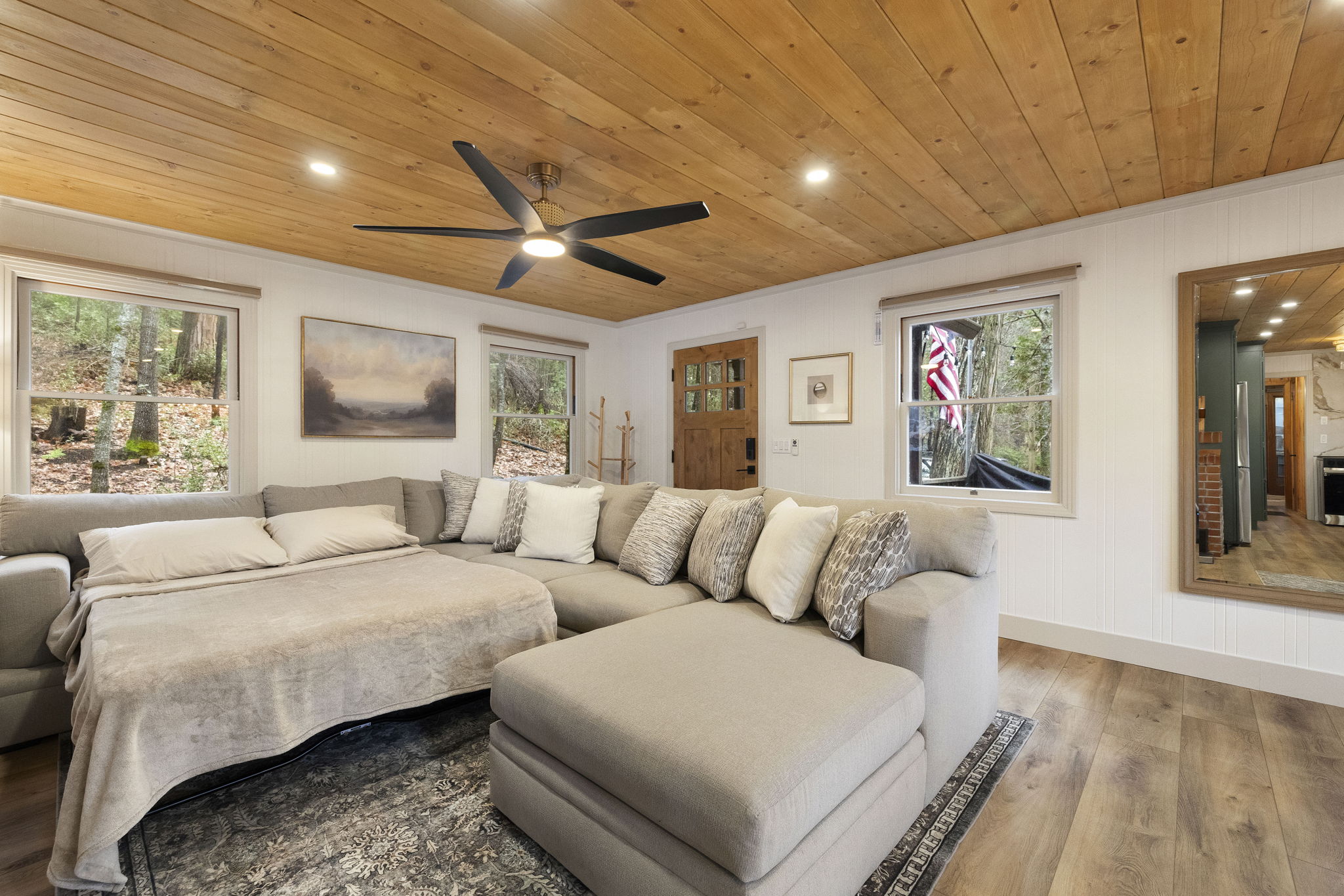 Pull out queen memory foam bed in living room. Additional sleeping on the couch as well.