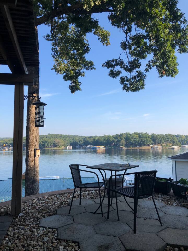 Have dinner on the patio with great views of the lake, and under the shade tree. 