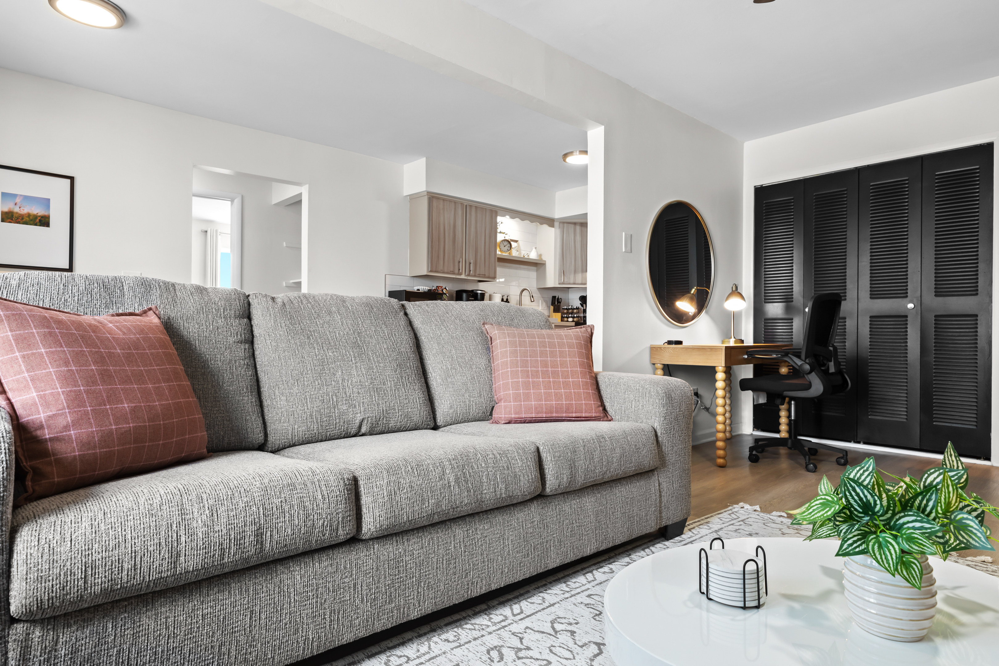 Inviting couch with soft cushions, perfect for relaxing after a day of exploring.