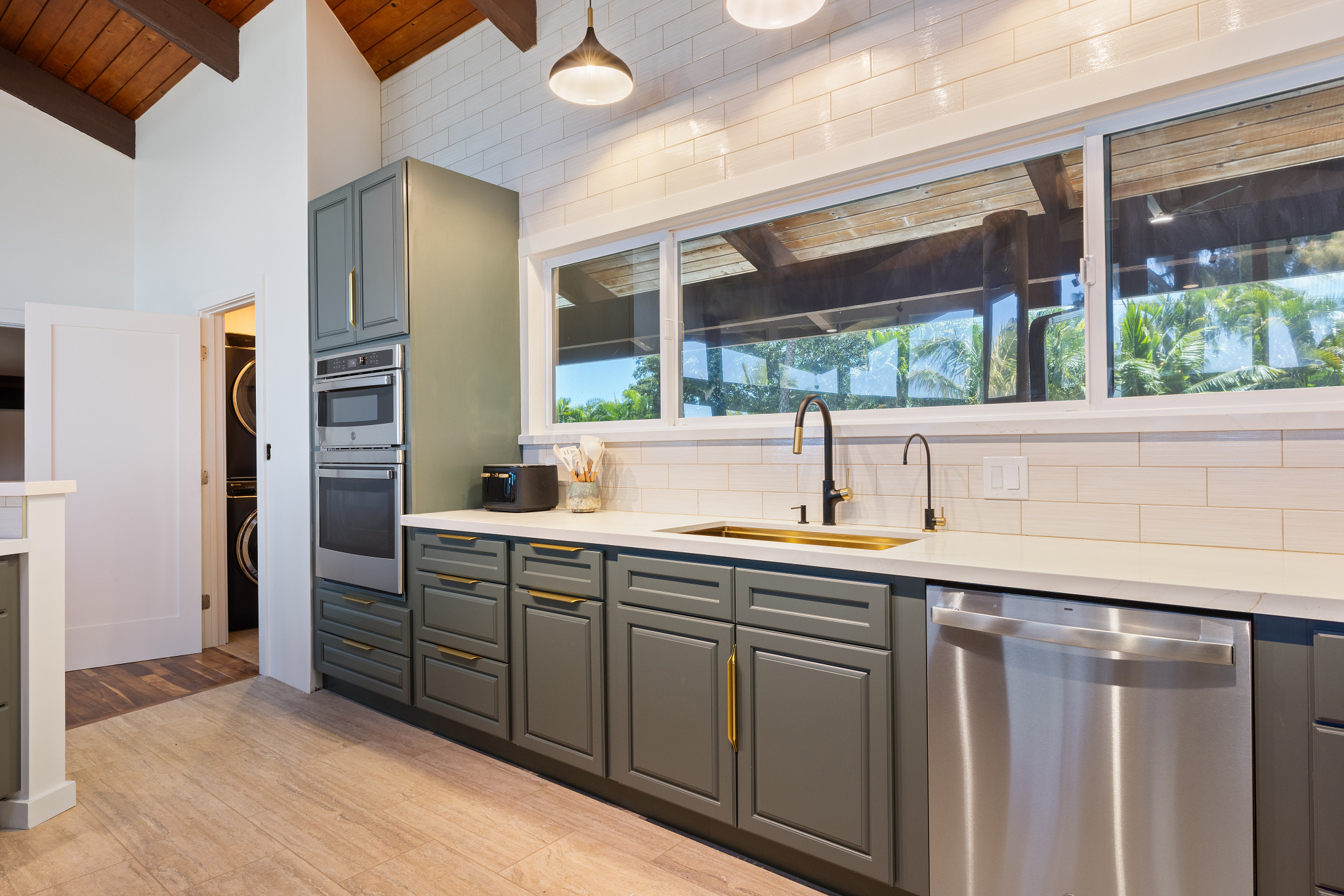kitchen with laundry room nearby