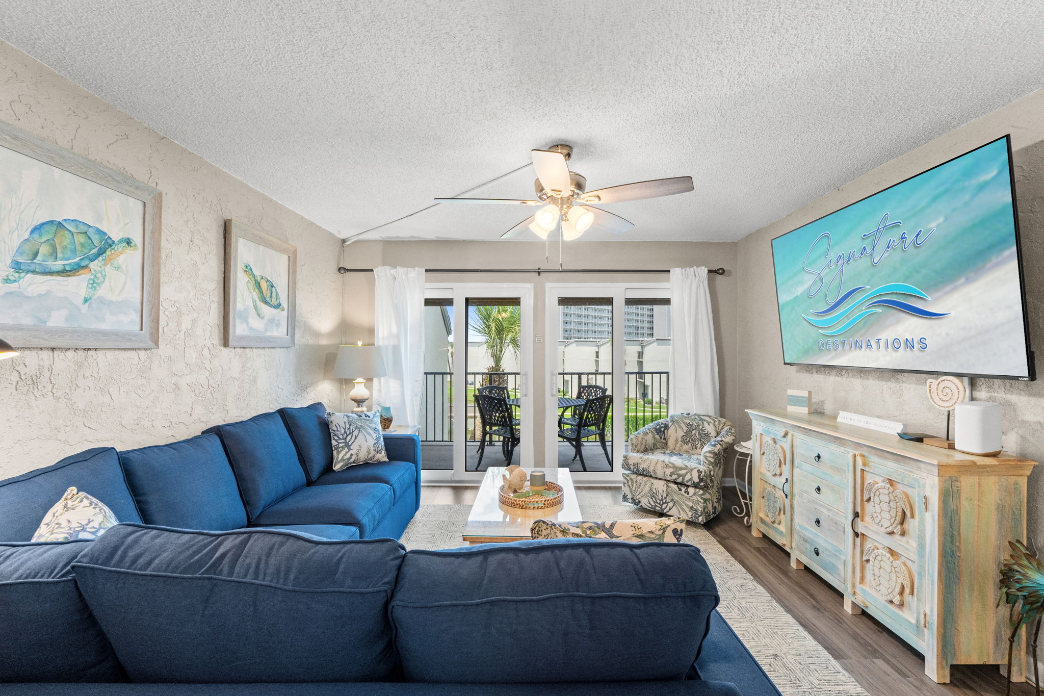 Living Room with Queen Sized Sleeper Sofa and Balcony Access