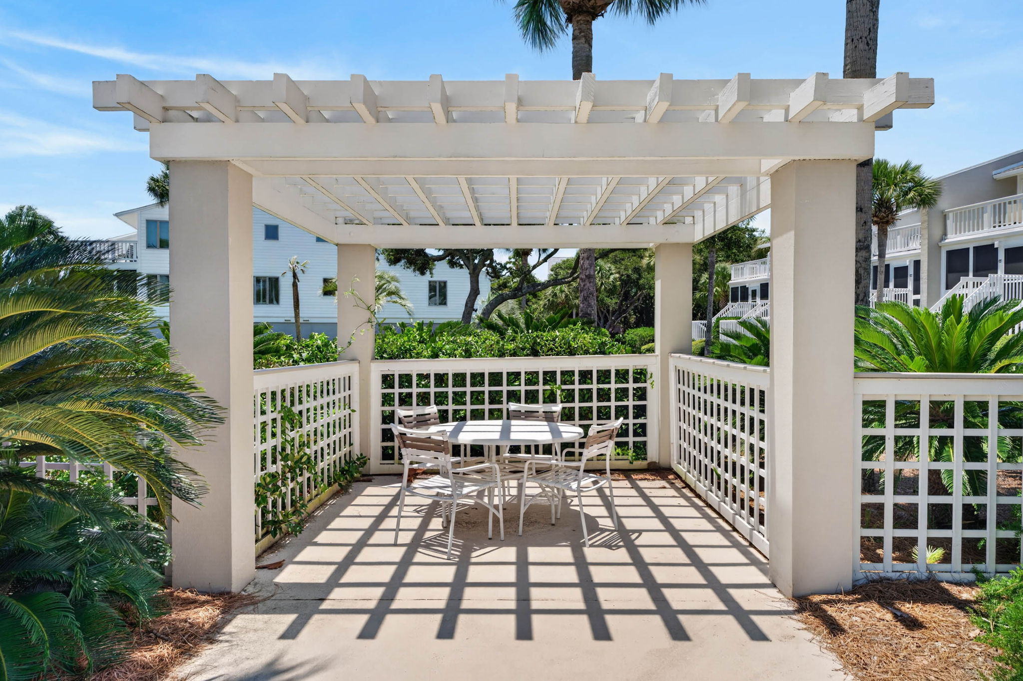 Dining table at pool | Oceans 22 | 22 Beach Club Villas, Wild Dunes | IOP Escapes