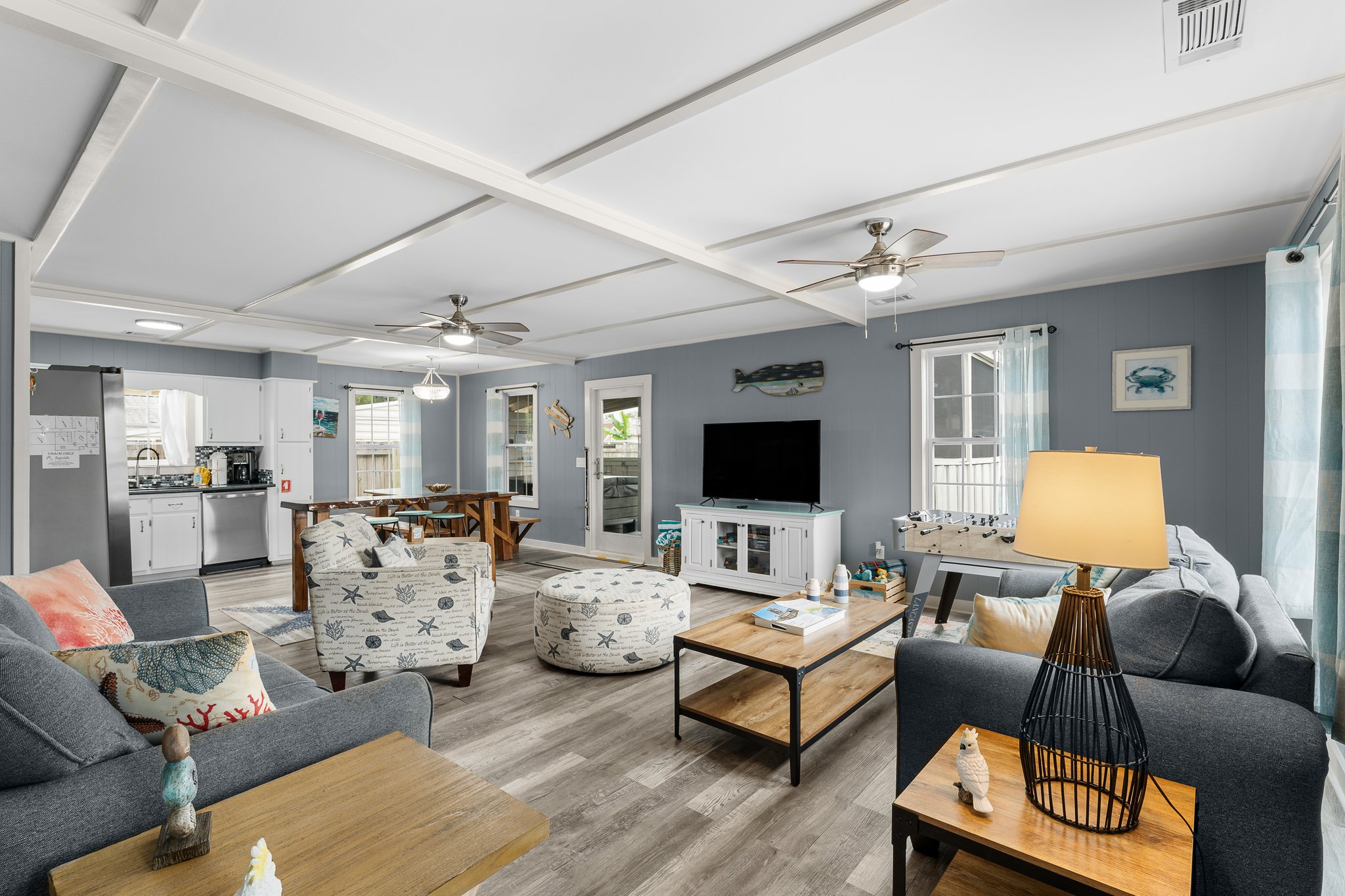Great room, coffered ceiling, foosball, dining