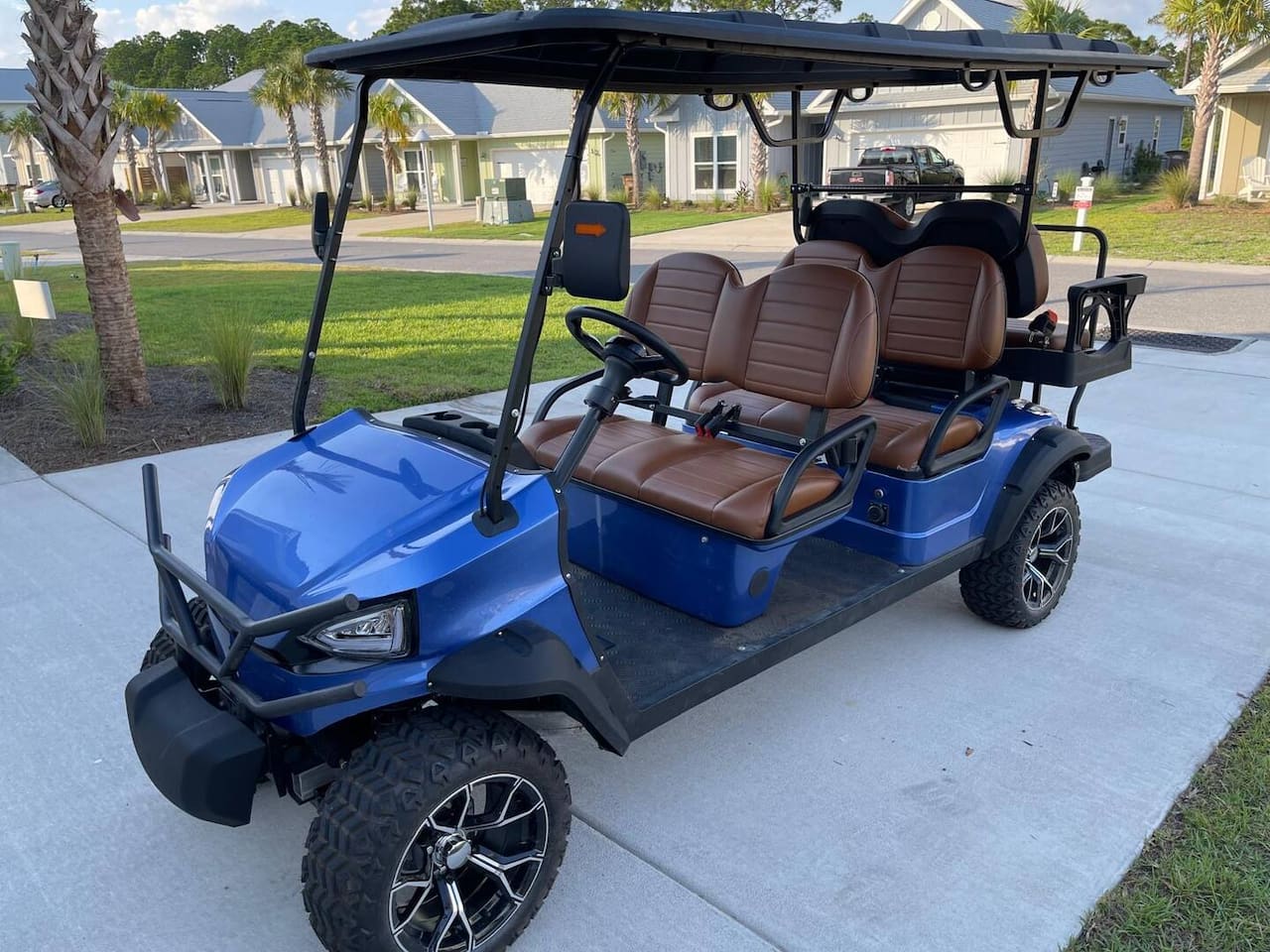 Included in your stay, 6-seater golf cart delivers a smooth ride to town.