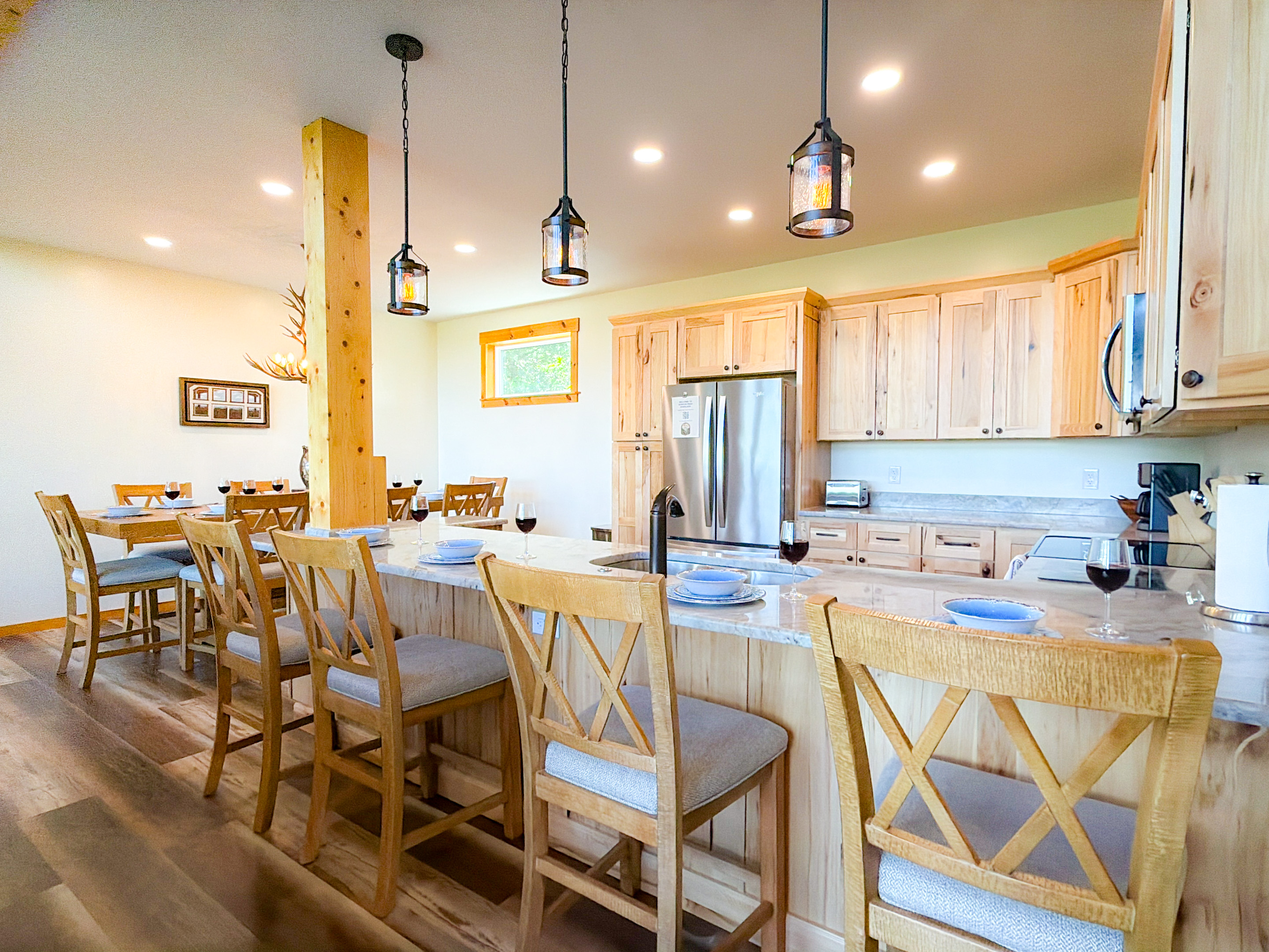 Bar top seating. Granite countertop tops perfect for morning coffee of additional seating for larger familes.