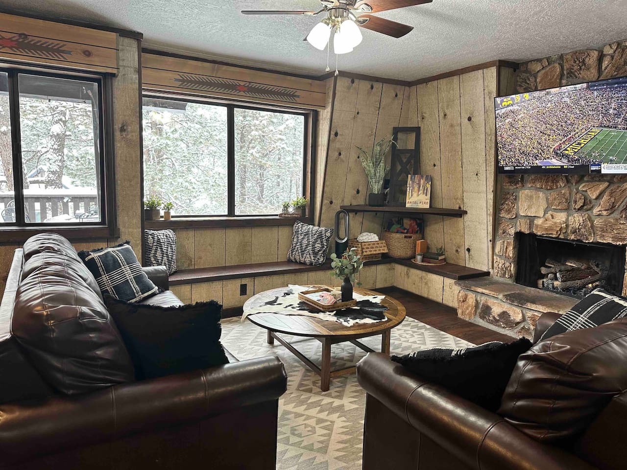 Beautiful views on a snowy day, cozy up by the fire and watch some football!