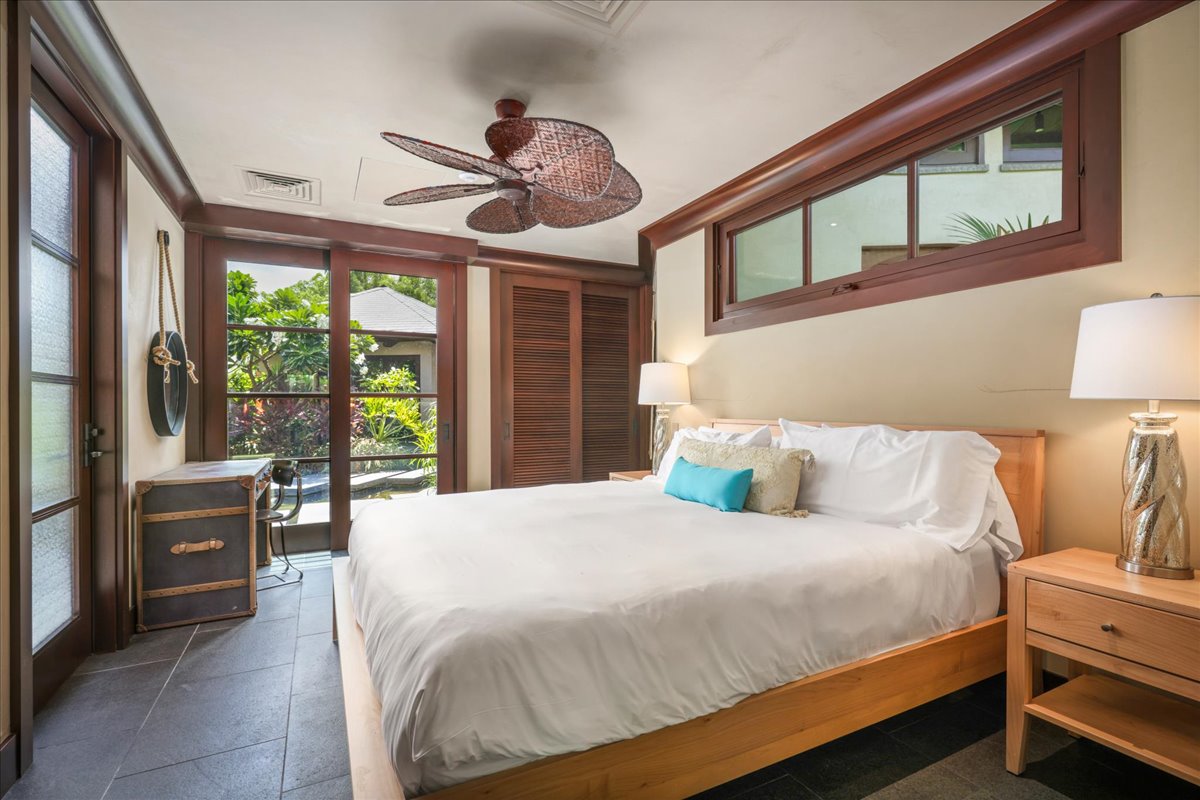 Bedroom 4 overlooking the Koi Pond features an ensuite bathroom with outdoor shower