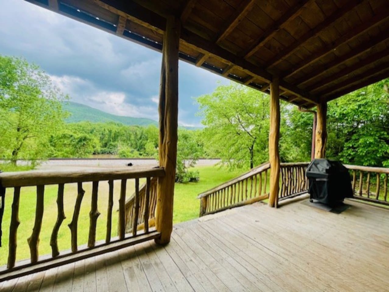 Roomy front porch with a gas grill. Yoga anyone?