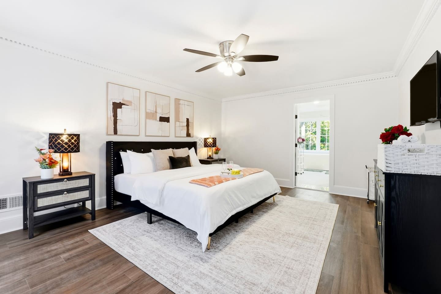 Spacious main-level master bedroom featuring a king bed, a Roku-powered Smart TV, and conveniently located to the left as you enter the home. This room includes 2 full-body towels, 2 washcloths, and 2 hand towels for your stay.