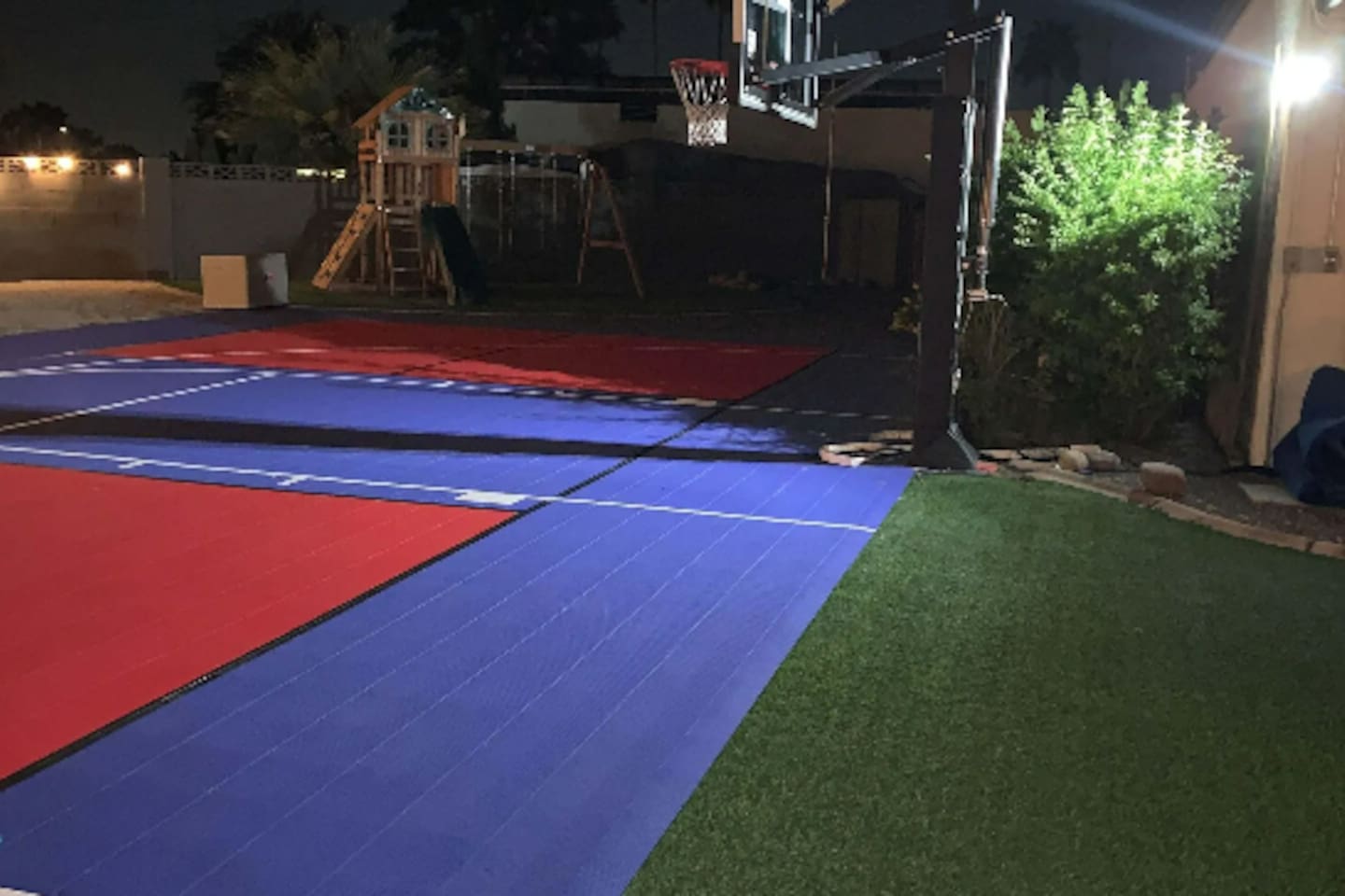 Regulation hoop, pro-grade surface — ready for pickup games well after the sun goes down.