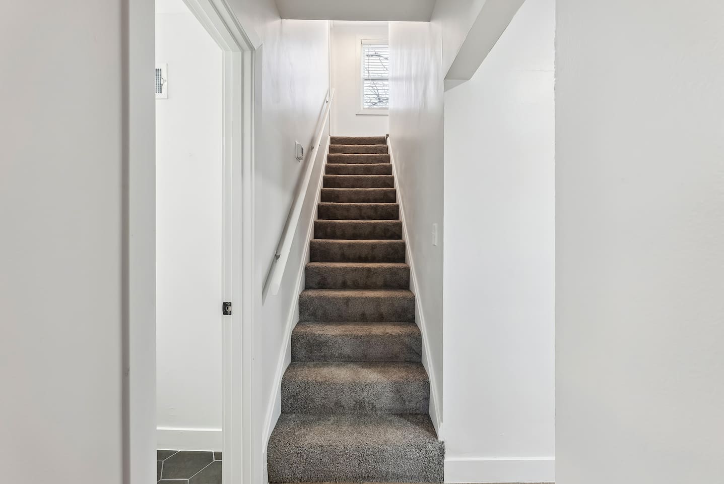 Stairs leading up to the king bedroom.