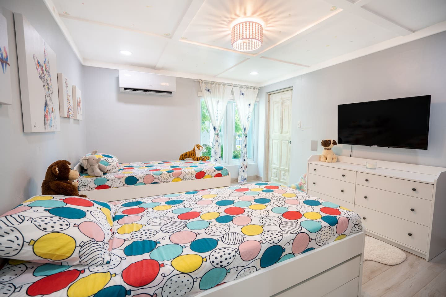 Our girls room:) This room has the two twin beds with the 2 trundle beds. Our girls love to have friends over and jump from bed to bed. 