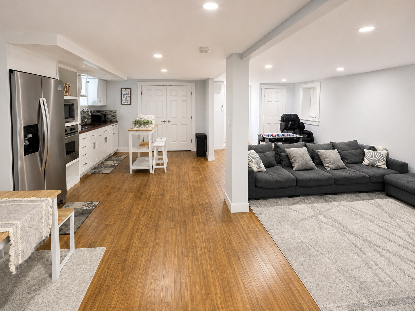 Basement lounge with full second kitchen and workspace