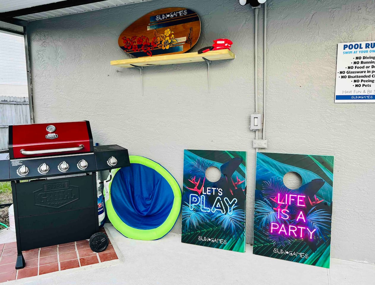 Grill available for you to use. 
Several floats at the house are always present.
Cornhole boards set for you to play.