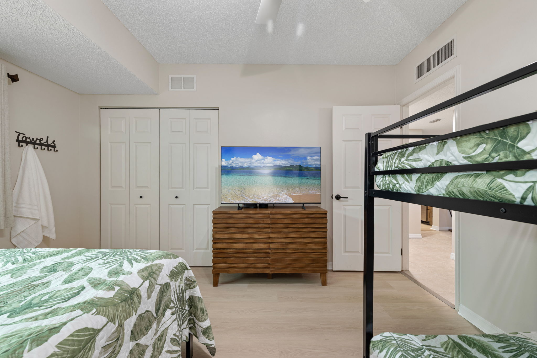 Bedroom 2: Queen & twin bunk beds, sleeps 4.