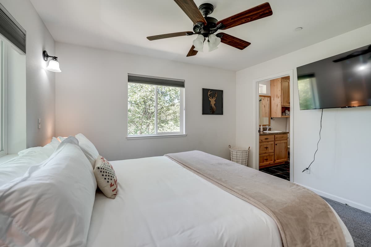 King bedroom with TV and private ensuite for added comfort and privacy