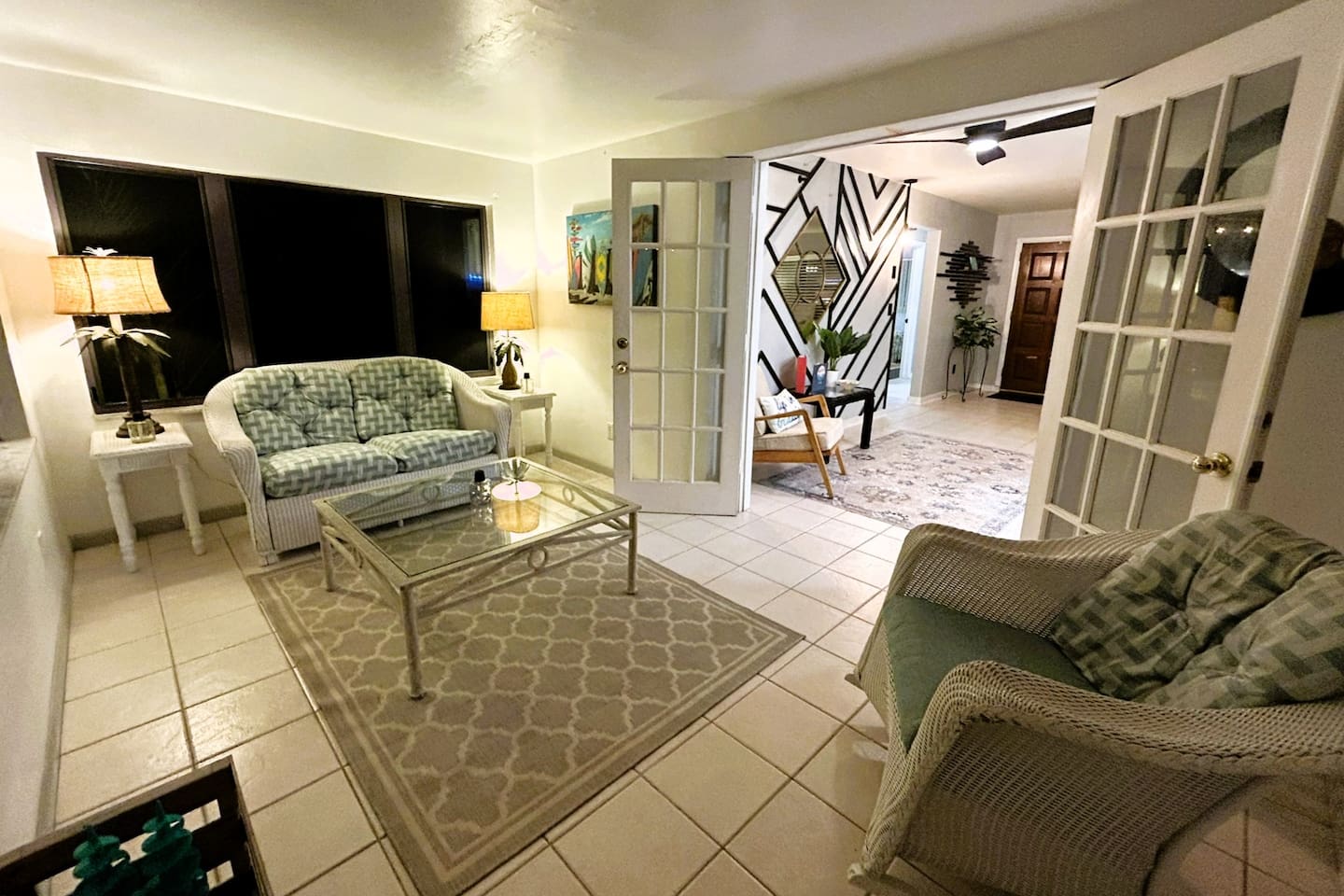 Screened Lanai, to relax and get some fresh air in our comfortable rocking chair or loveseat. Perfect for enjoying a cup of coffee or a good book.