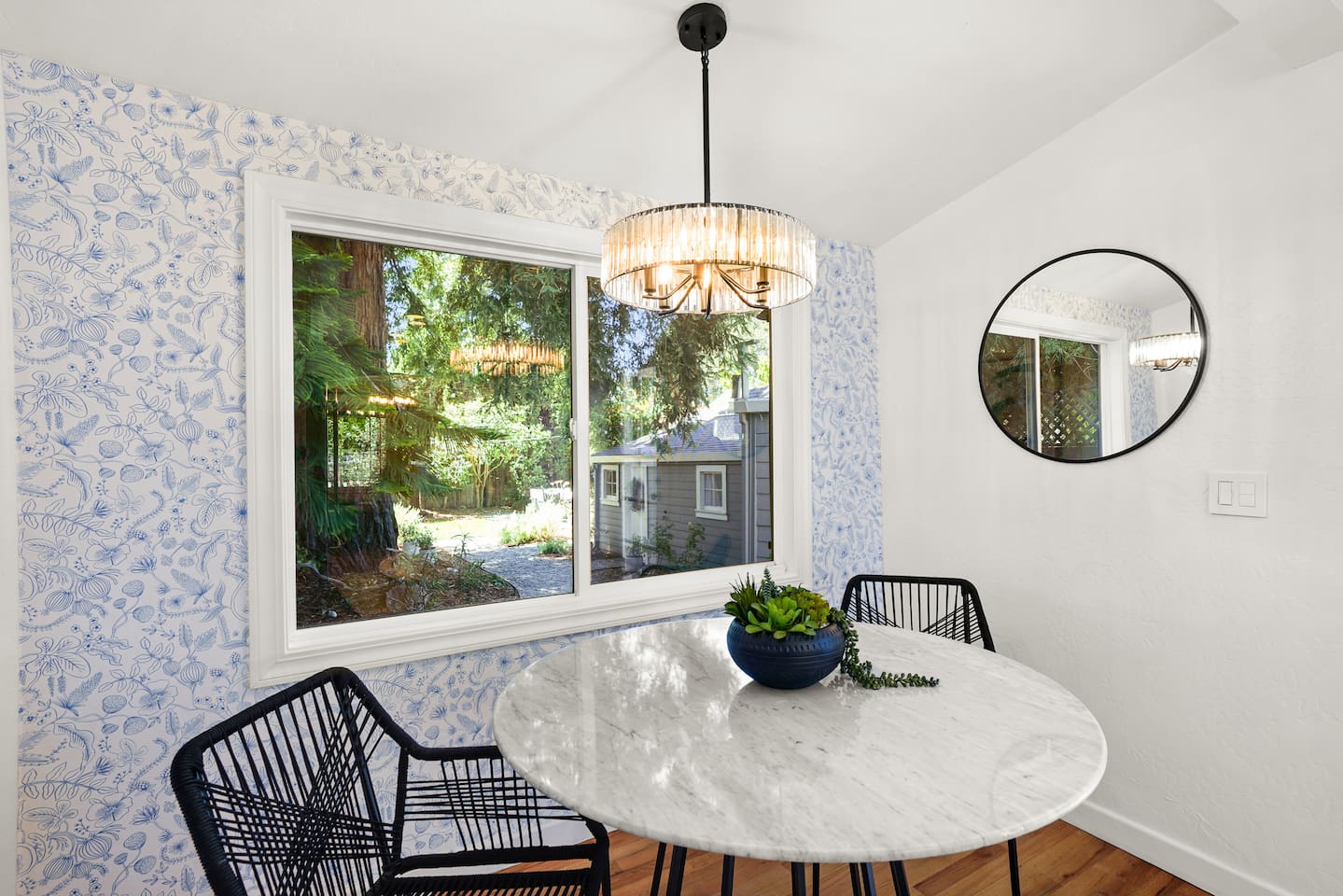 Dining area with stylish seating, natural light, and the perfect space to gather for meals, coffee, or wine nights.
