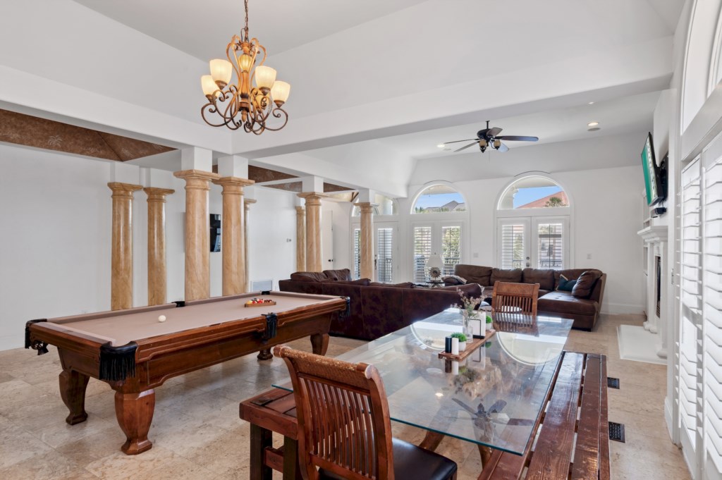 Large open-concept layout connecting the kitchen, dining area, and living room