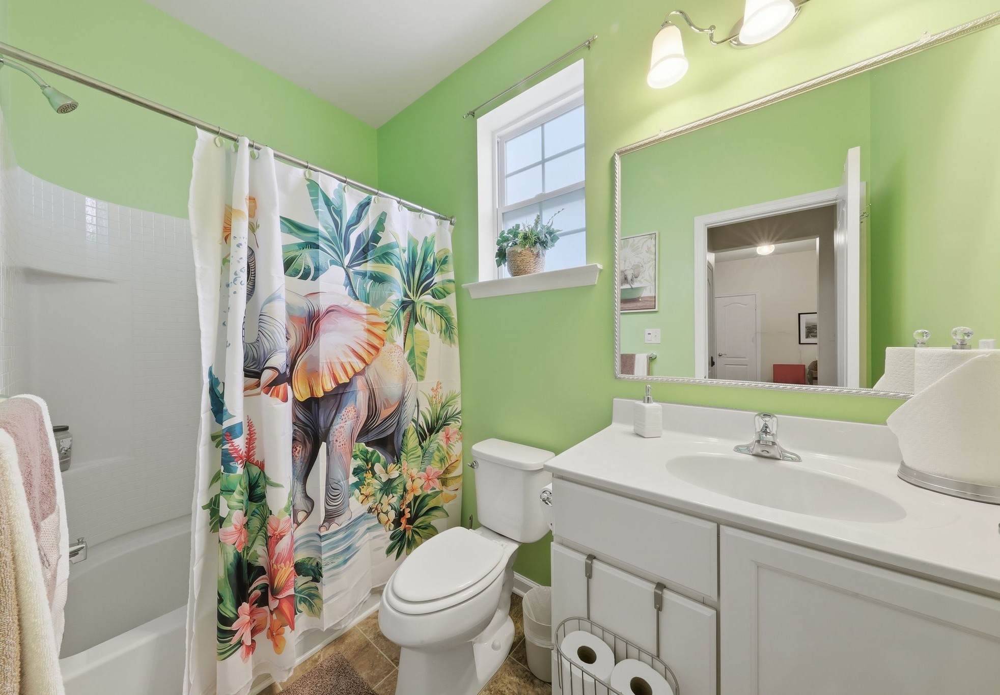 Bright bathroom with plenty of storage.