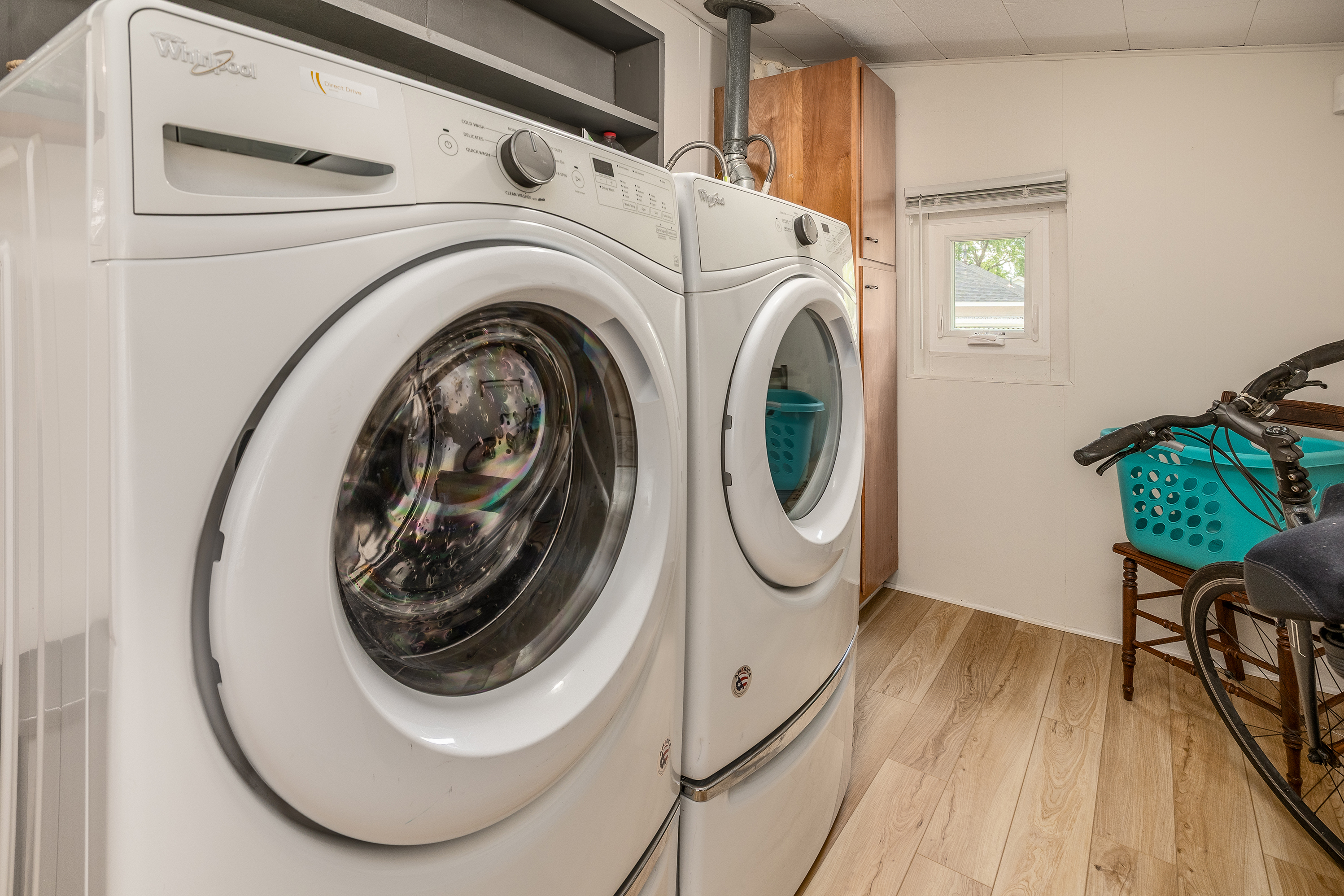 Laundry day, simplified. Front-loading washer and dryer ready for your use.