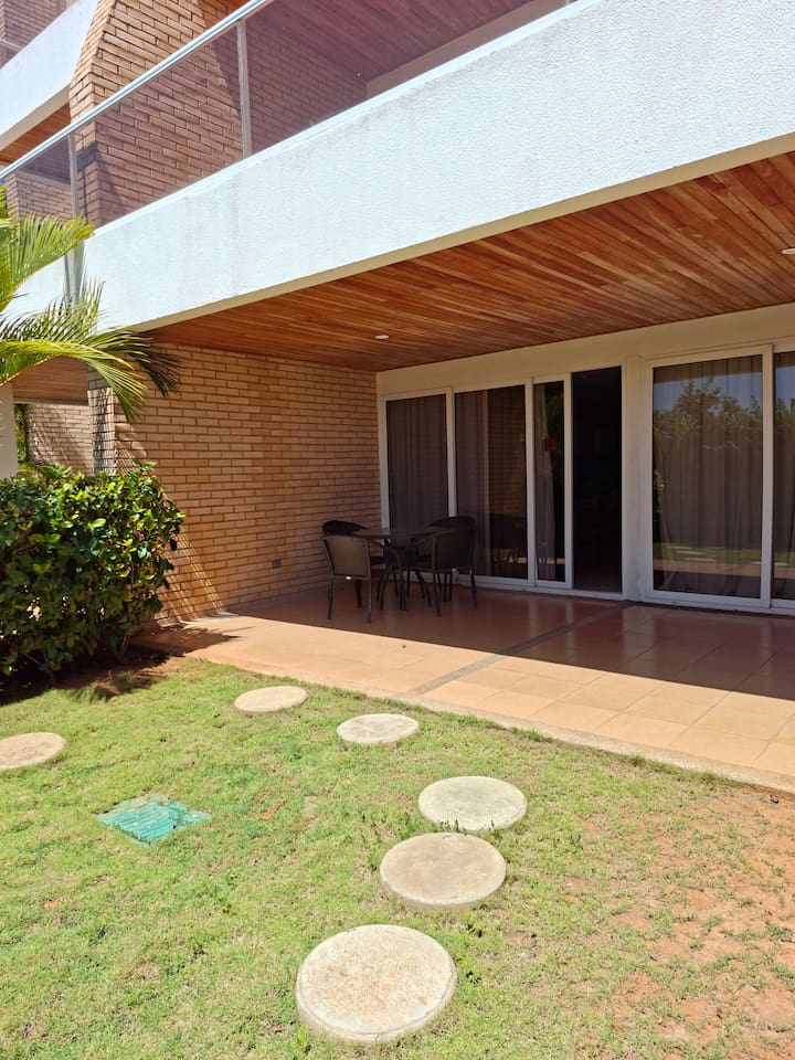 Step outside to a peaceful garden area, perfect for sharing with your family.