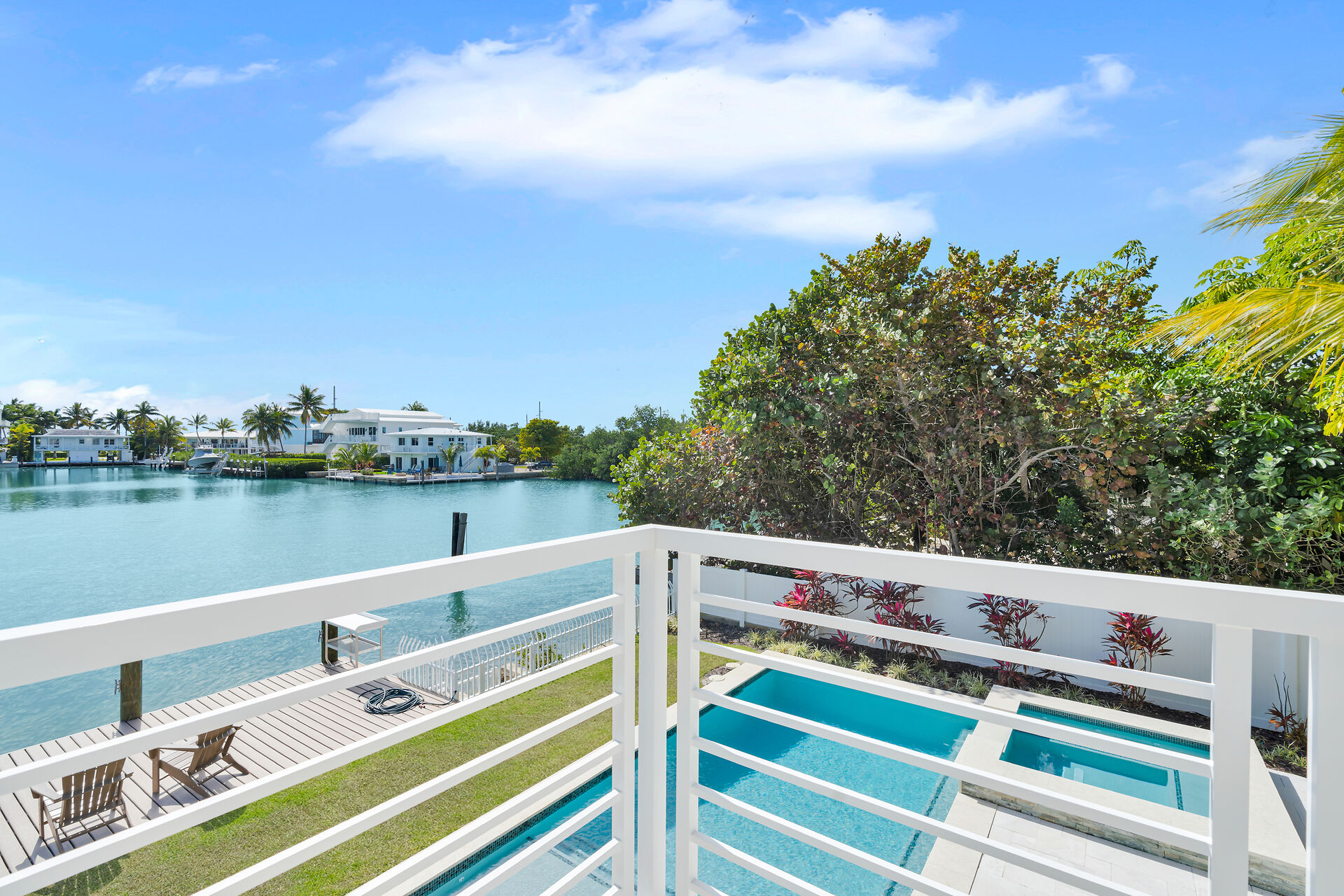 Pool, dock and cove views from the terrace. 