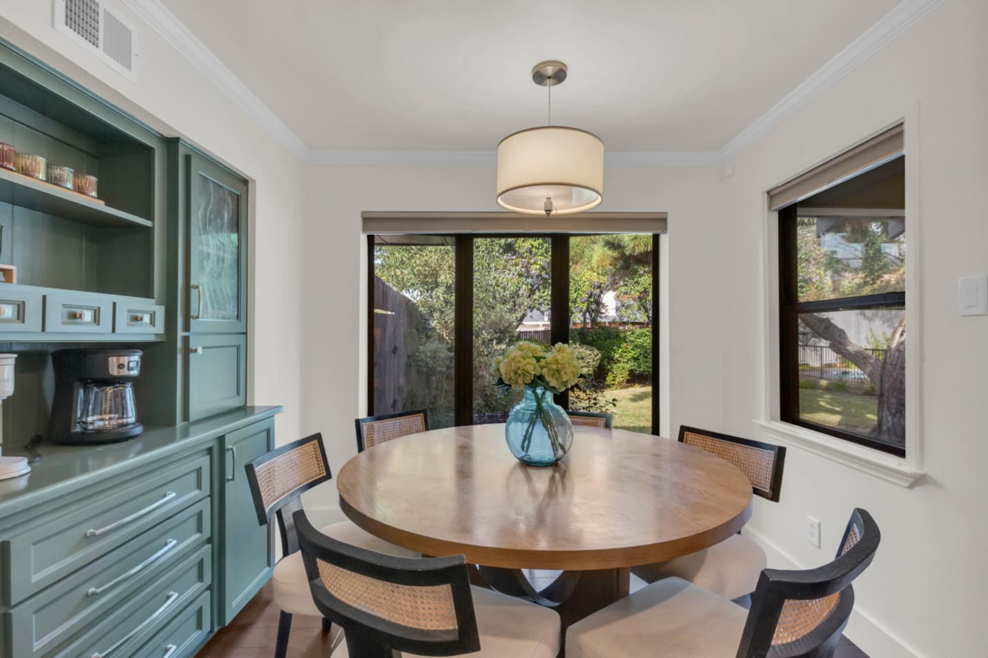 Kitchen nook conveniently located next to the coffee bar, creating a cozy spot for morning coffee, casual meals, or planning the day. The open layout keeps this area connected to the kitchen and living spaces, making it both functional and inviting.