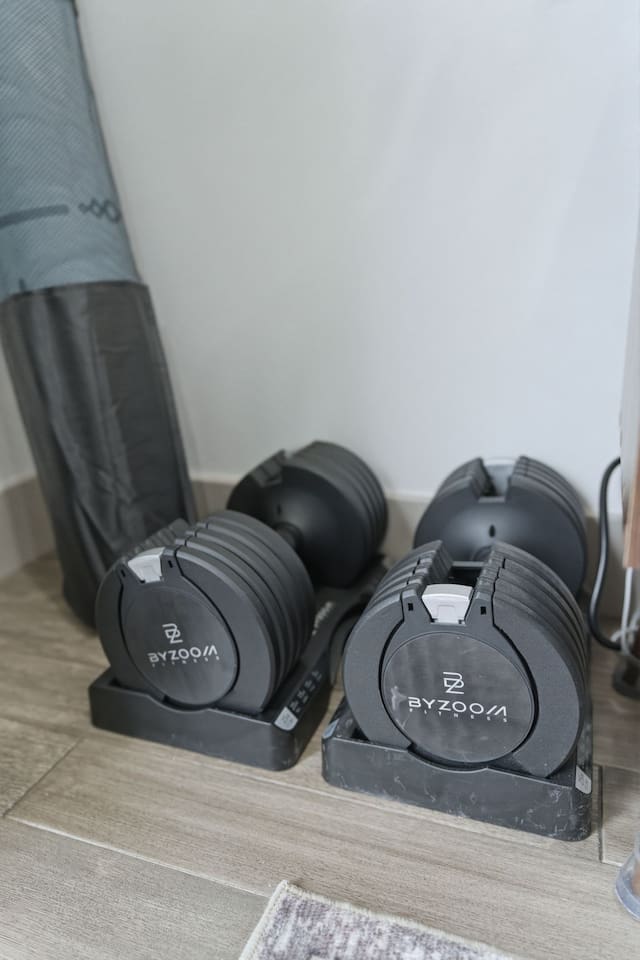 Adjustable dumbbell set available for guests who want to stay active during their stay.