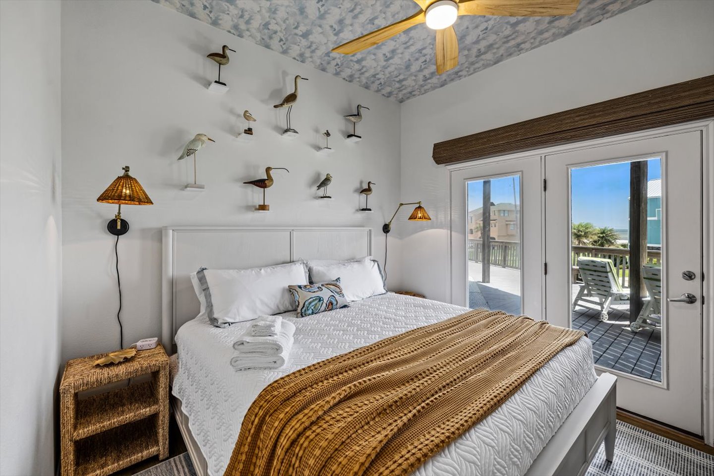 The Shorebirds! This King bedroom is so much fun! The Shorebird Bedroom overlooks the Gulf, with deck access and remote control black out blinds. Great views too! 