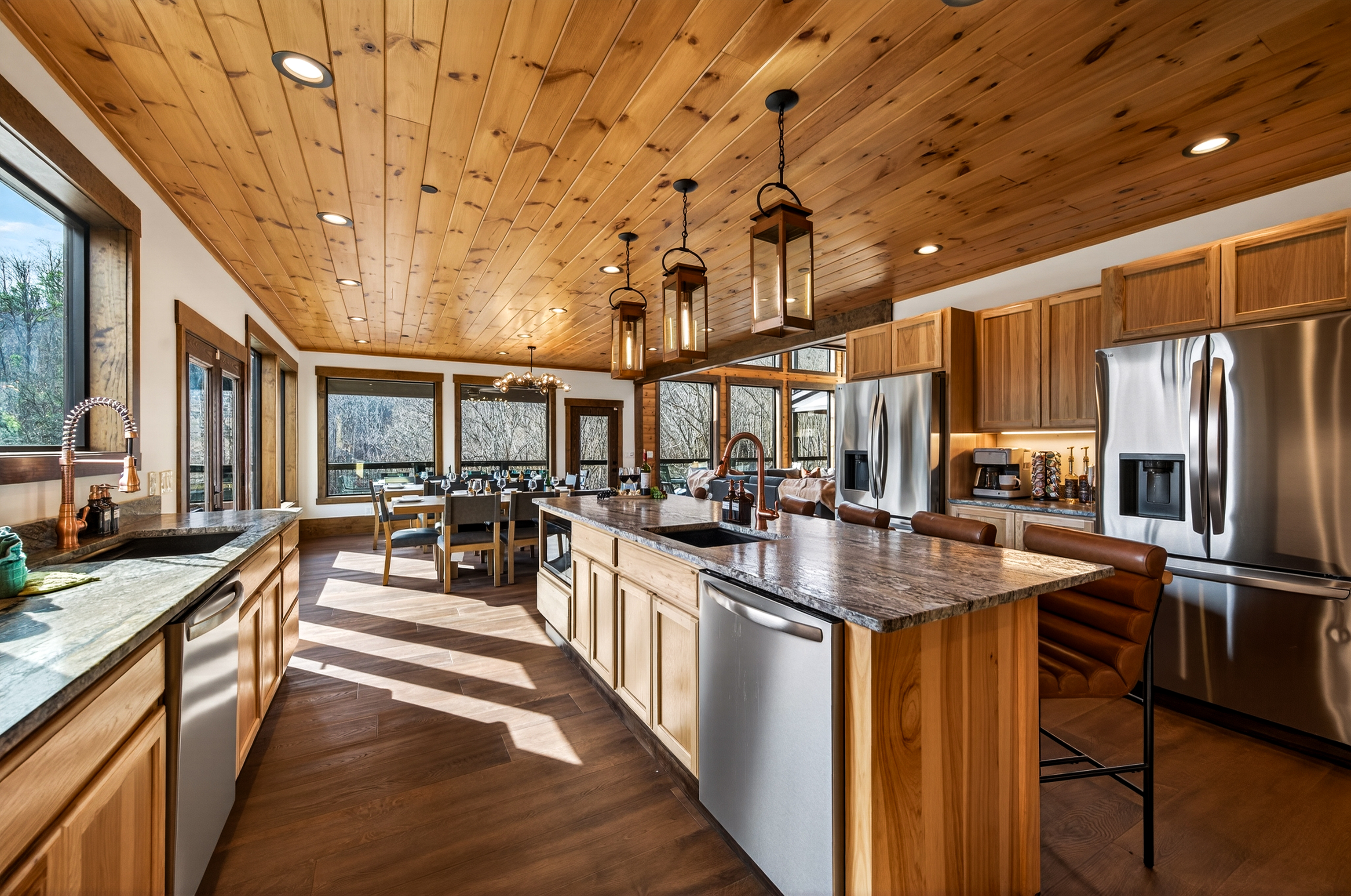 🍽️ Chef’s Kitchen– This fully stocked kitchen is designed for gathering & entertaining, featuring 2 full-size refrigerators, 4 ovens, 2 dishwashers, 2 microwaves & 2 sinks, plus a coffee bar. Perfect for preparing meals for the whole group.