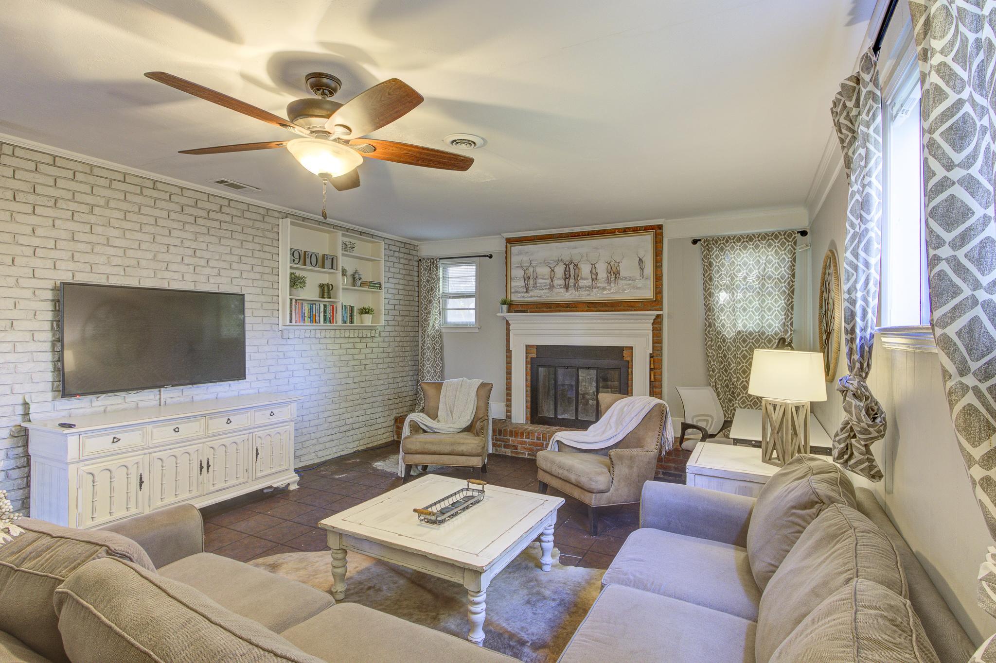 Spacious 2nd living room with desk, TV, and full size pull-out sofa bed