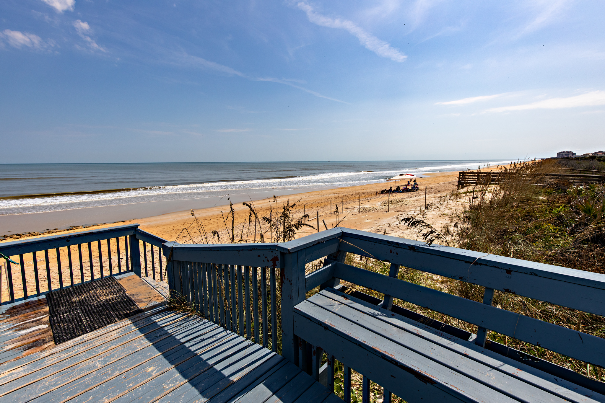 Your private boardwalk to the Atlantic — just steps from the sand, with miles of uncrowded shoreline and soothing waves waiting below. 🌊☀️
