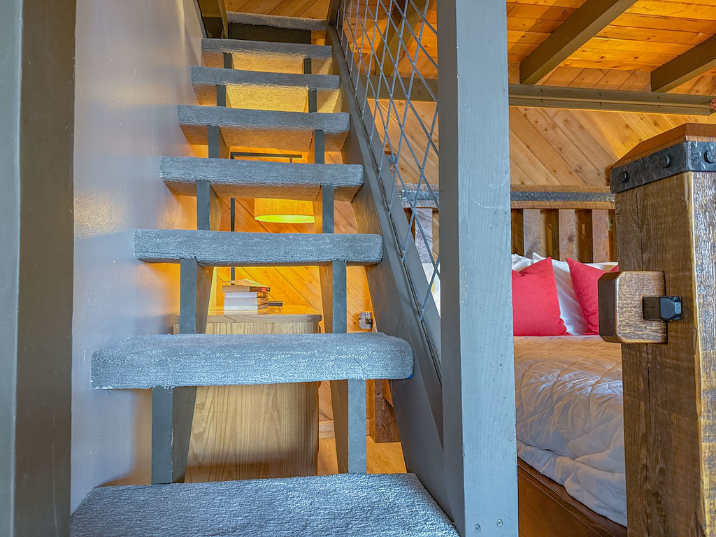 Climb the stairs that lead to the loft...