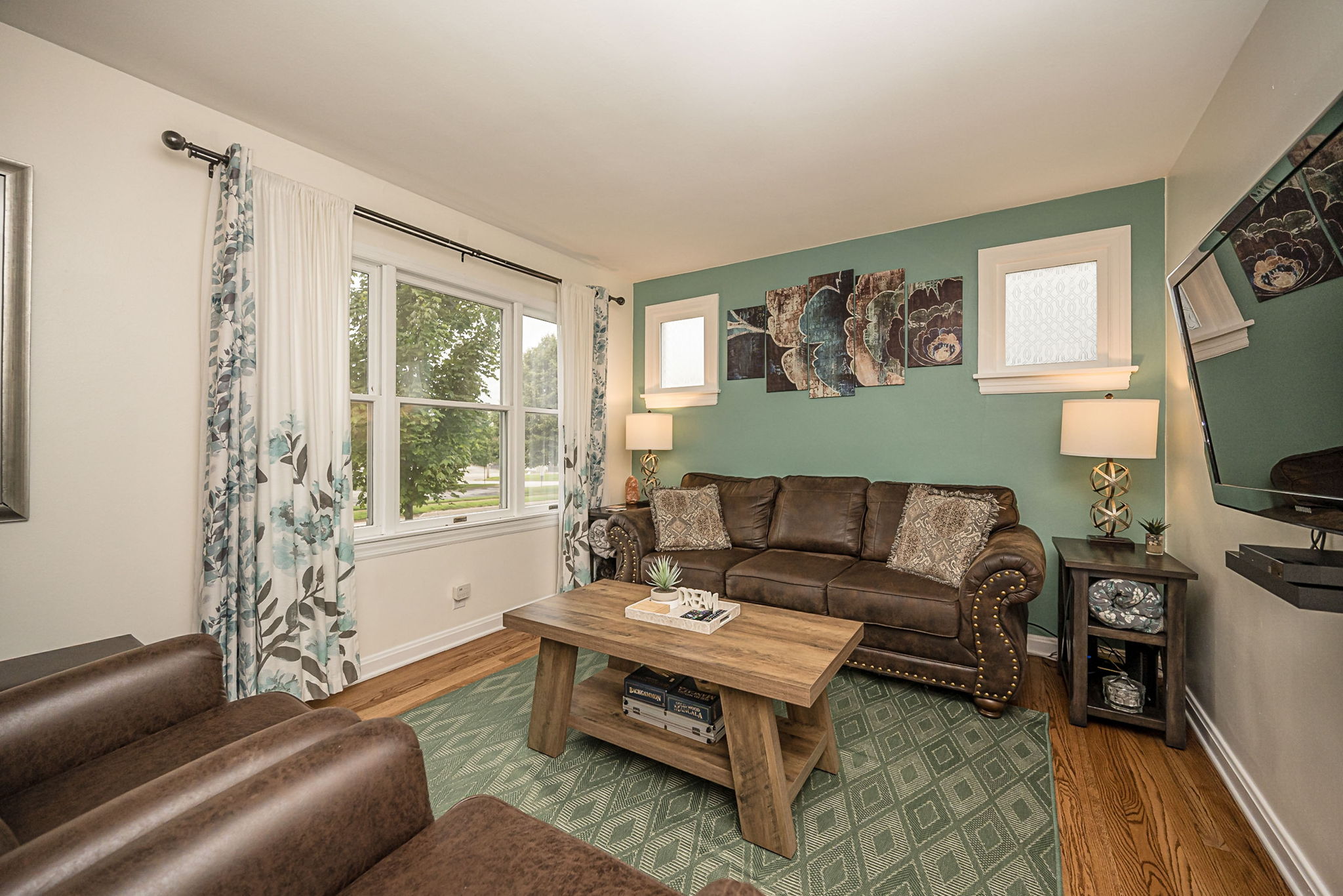Natural light fills the cozy living room throughout the day.