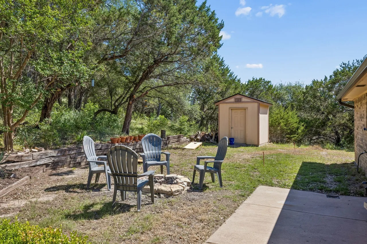 Fire-pit seating area in the private waterfront yard.
