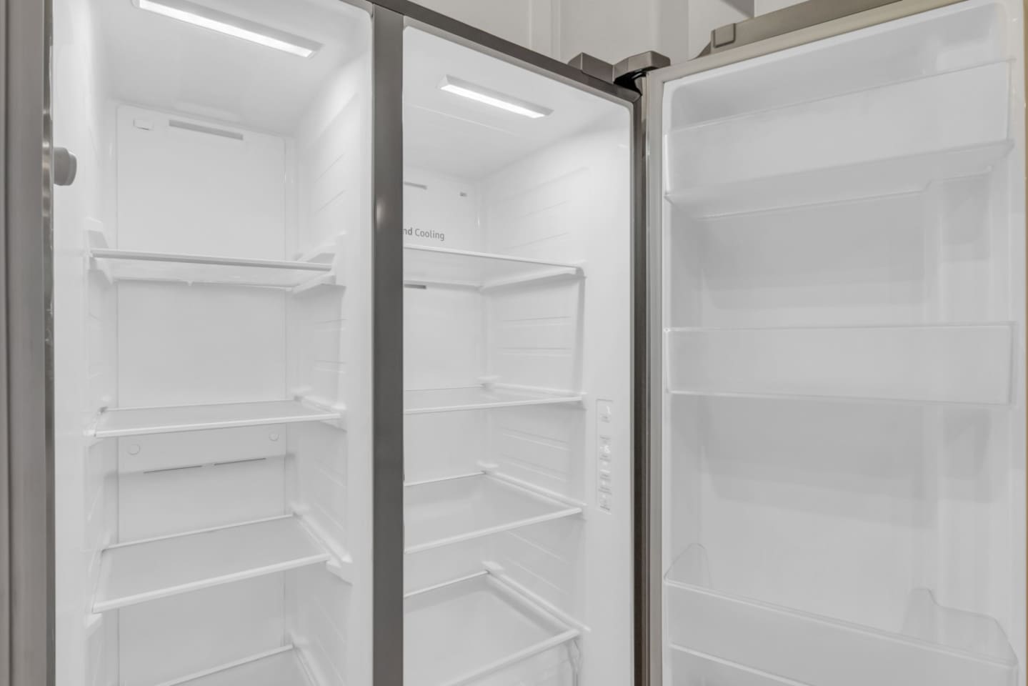 Spacious refrigerator with modern stainless steel finish.