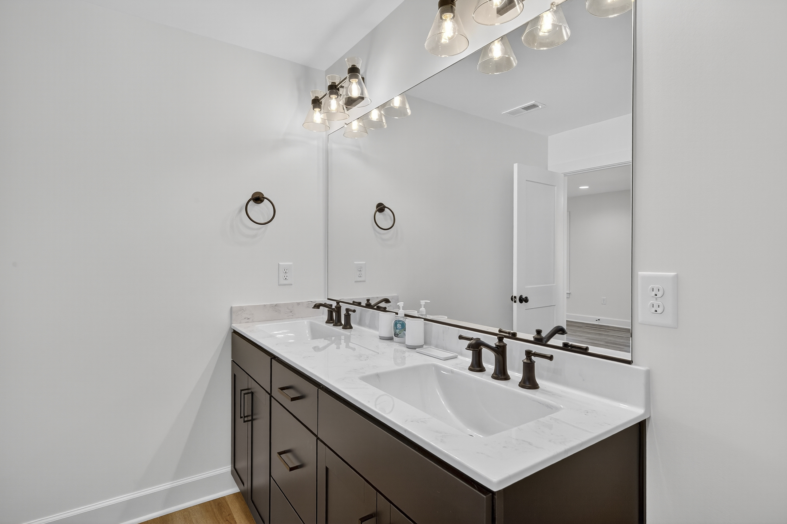 Spacious dual vanity for convenience and style, perfect for morning routines.