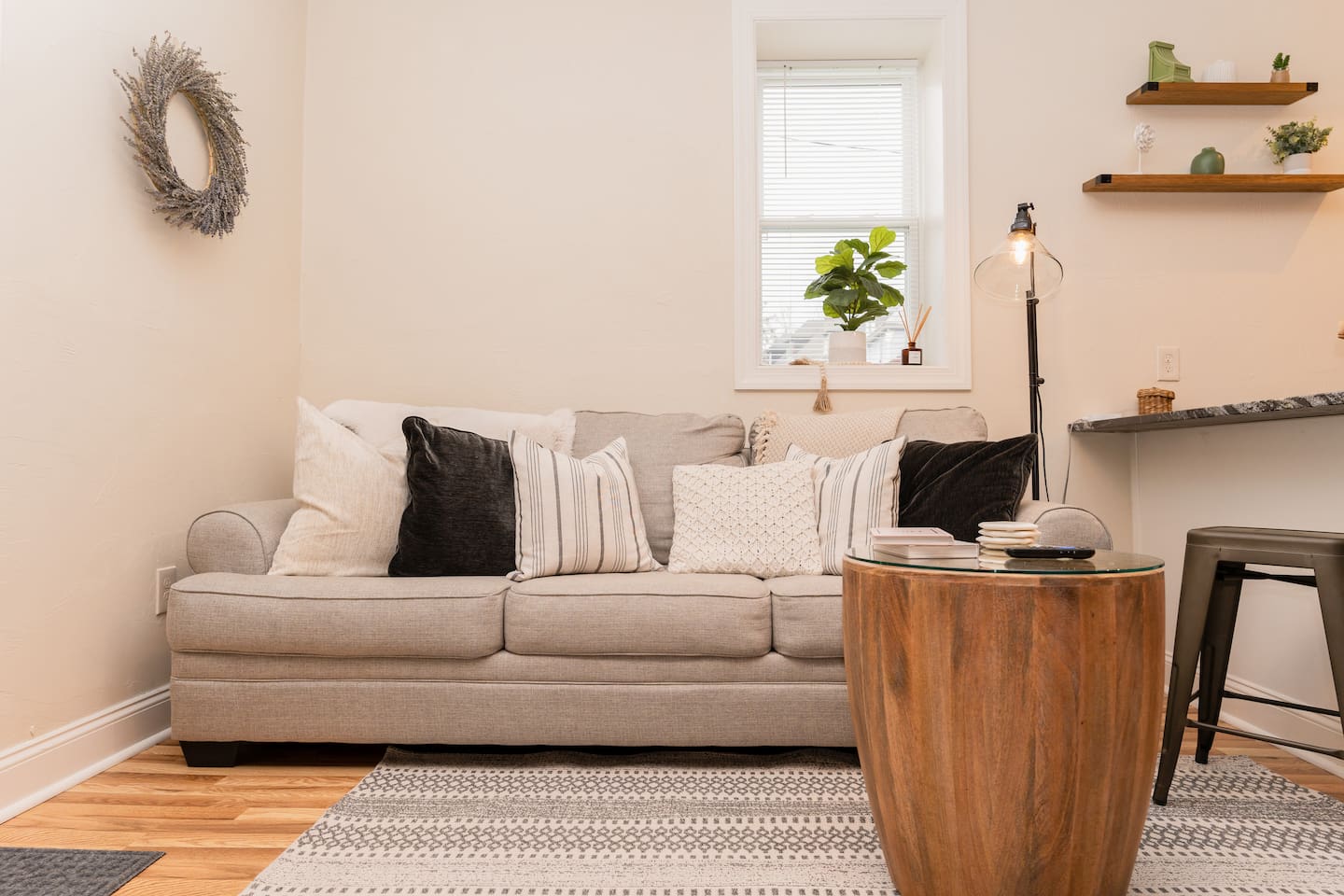 Comfortable couch in the living room, perfect for unwinding and relaxing.