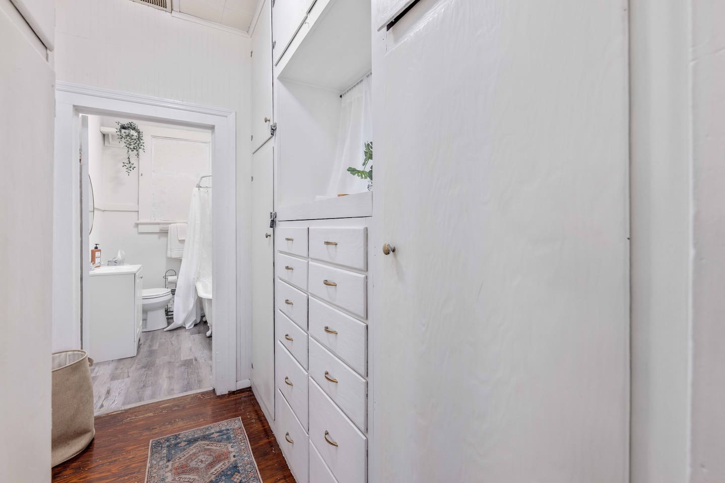 Hallway leading from master bedroom to bathroom/living room. 