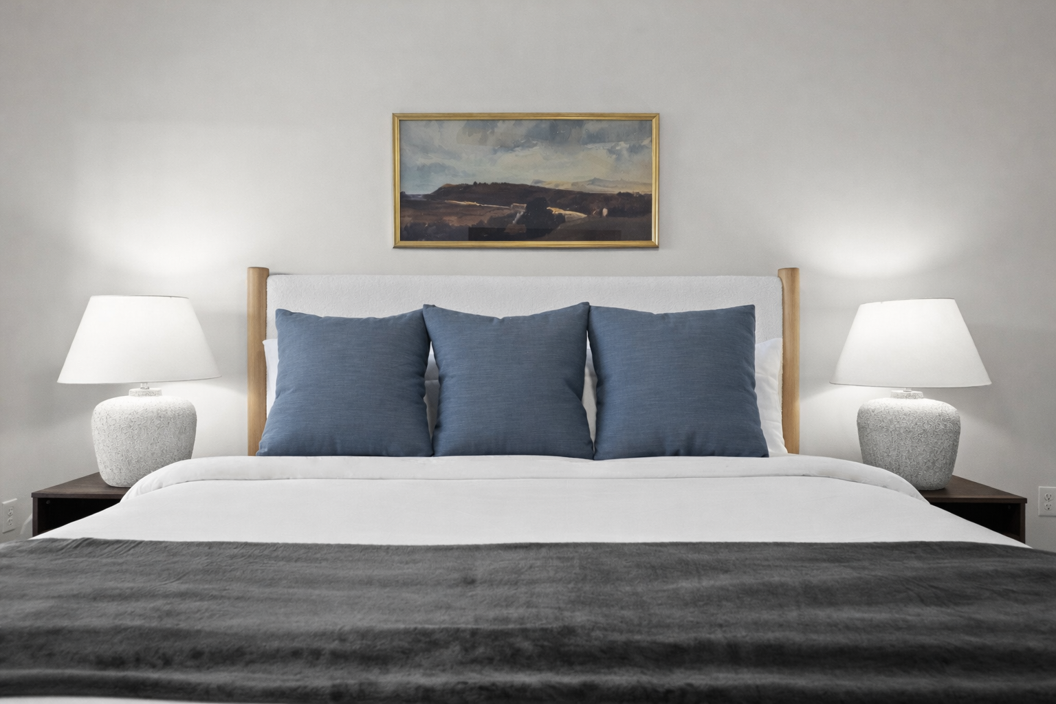 Serene bedroom with plush king bed, soft lighting, and calming décor—perfect for restful nights and relaxed mornings.