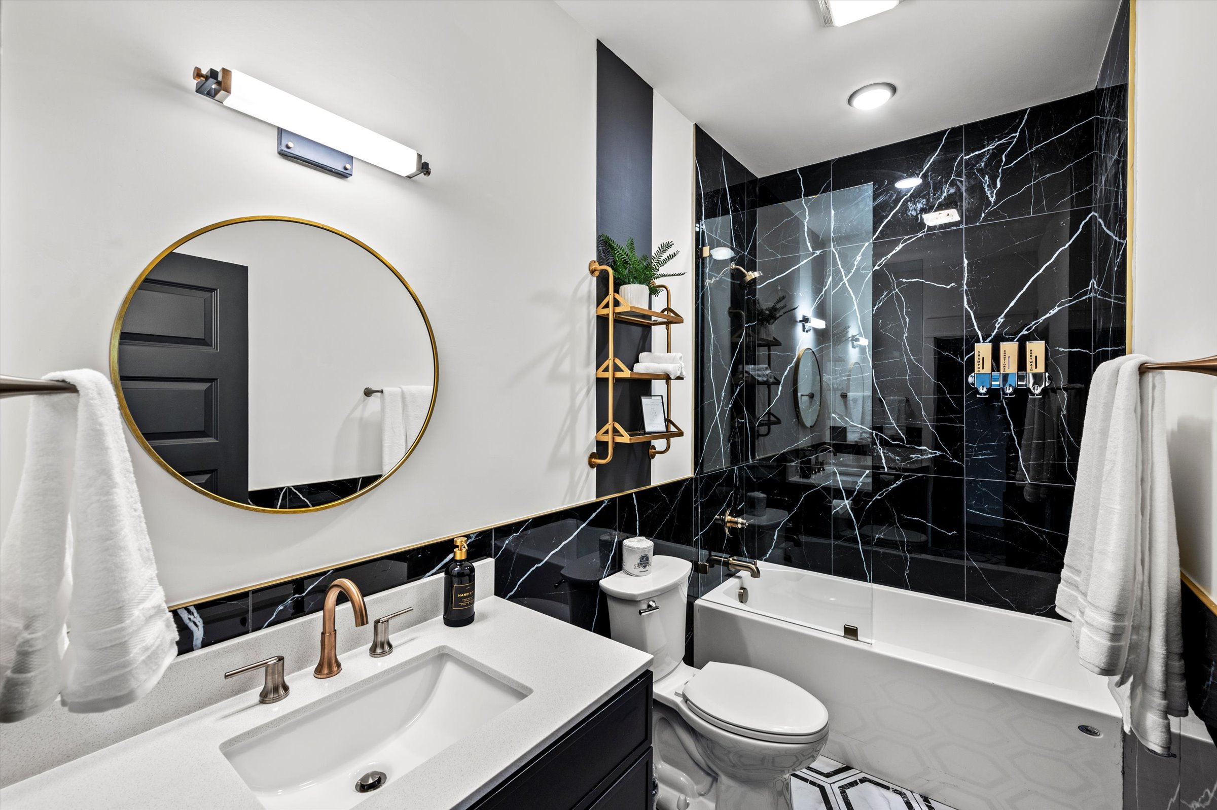 Private en-suite bathroom with a sleek, modern walk-in shower.