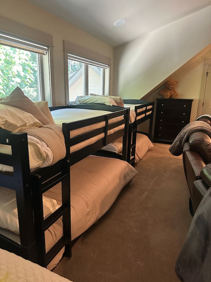 Children’s sleeping area with bunk beds.