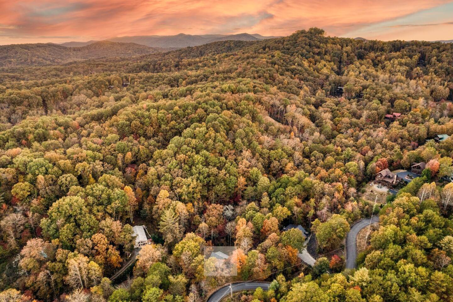 Cabin cocooned by majestic woods, a tranquil haven where nature's embrace whispers secrets of serenity and tranquility, offering solace beneath the towering canopy and a symphony of rustling leaves.