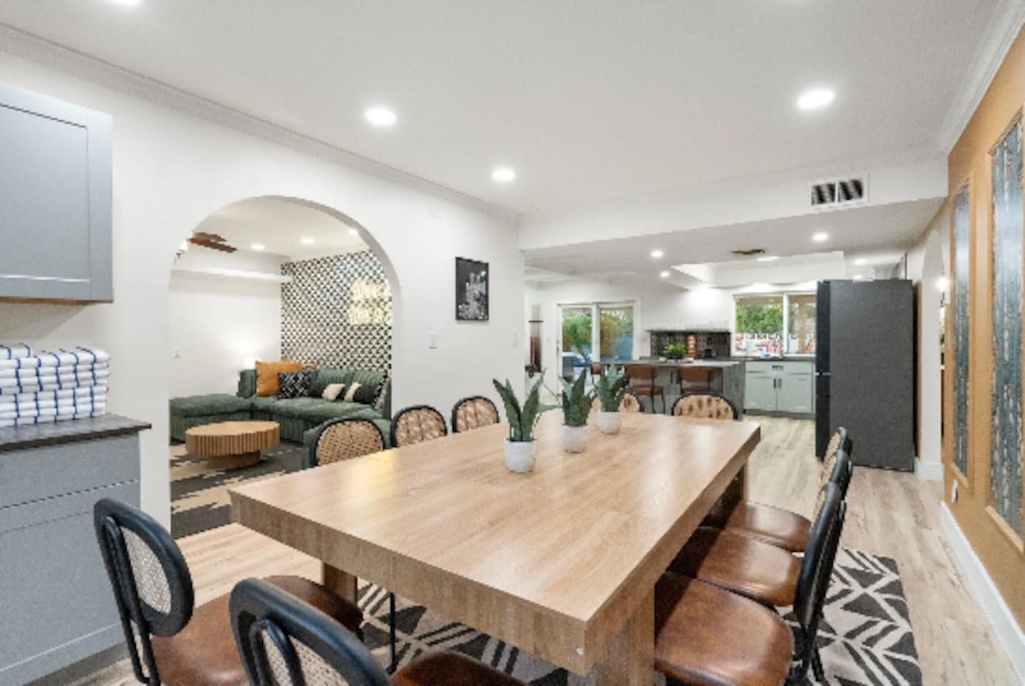 This table sits right at the heart of the home, with the kitchen on one side and the lounge just steps away. Whether it's a big group breakfast or a slow evening in, everyone stays connected without missing a beat.